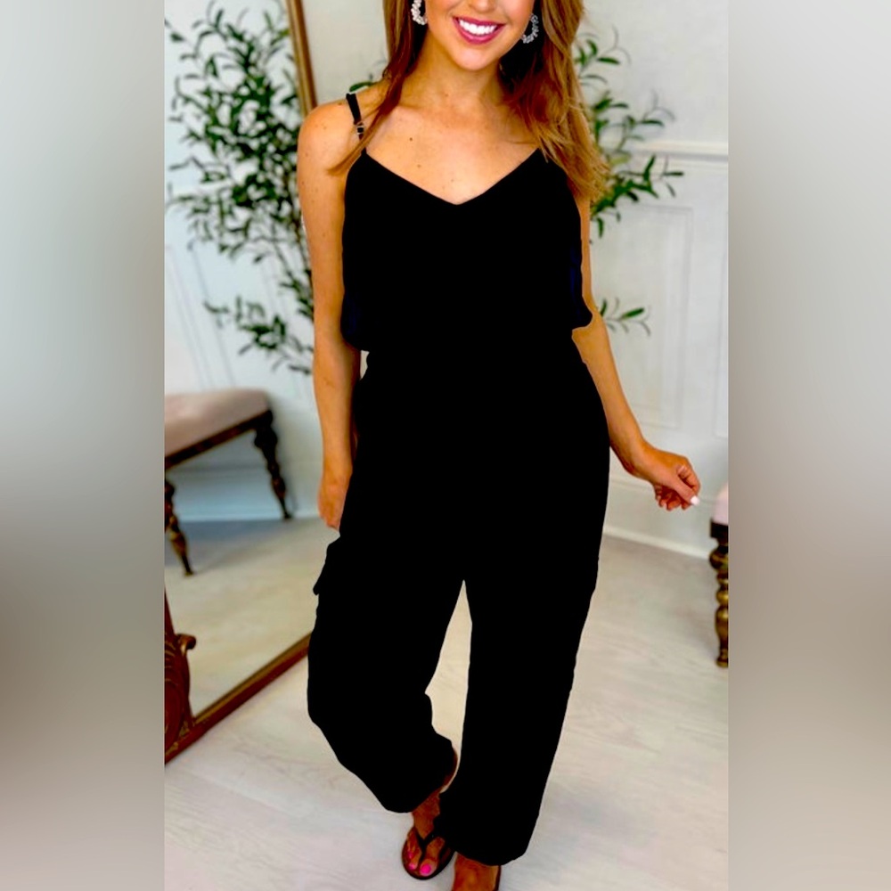 Black jumpsuit by:Kori size small